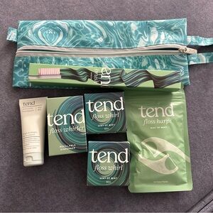 BAGGU x TEND zipper pouch with travel essentials